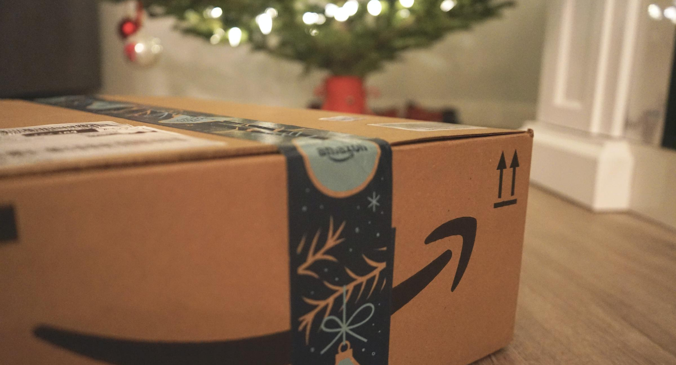 Cardboard box package underneath Christmas tree