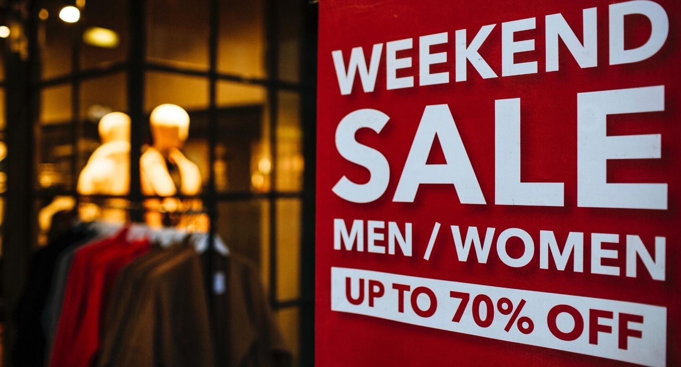  Sale discount sign at a clothing retail store